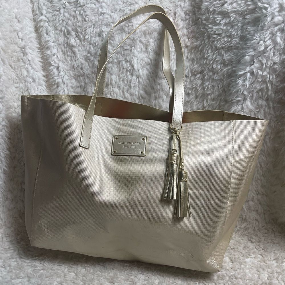 Michael Kors gold shimmery synthetic leather large tote bag .